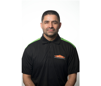 male, black servpro shirt