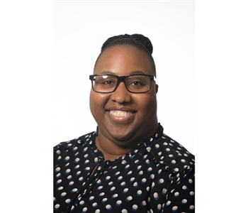 female, glasses, polka-dot top